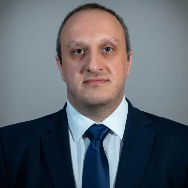 Professional headshot of Dr. Delair Alnajjar